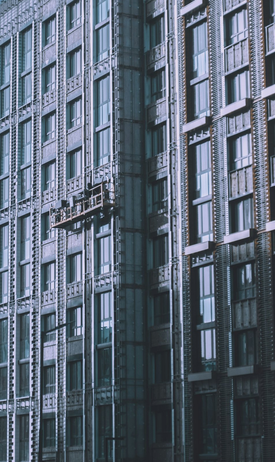 Generic building exterior photograph, illustrative placeholder, not NEXT Amani
